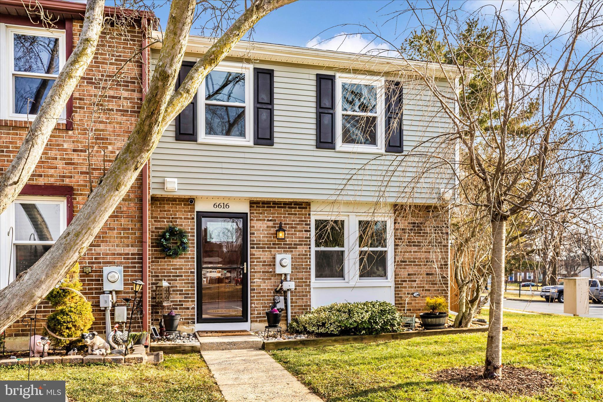 6616 Pebble Court Frederick, MD 21703 - Photo 25 of 33 a front view of a house with a yard