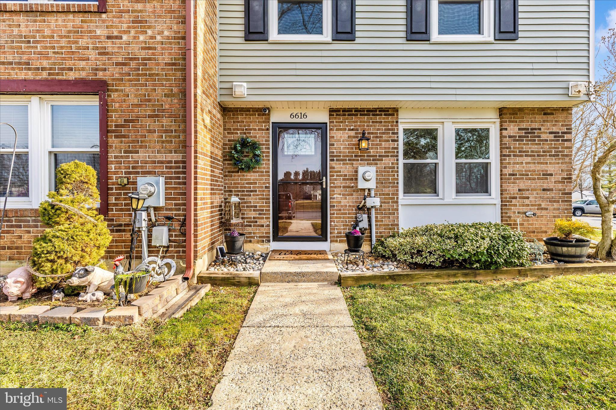 6616 Pebble Court Frederick, MD 21703 - Photo 26 of 33 a front view of a house having outdoor seating