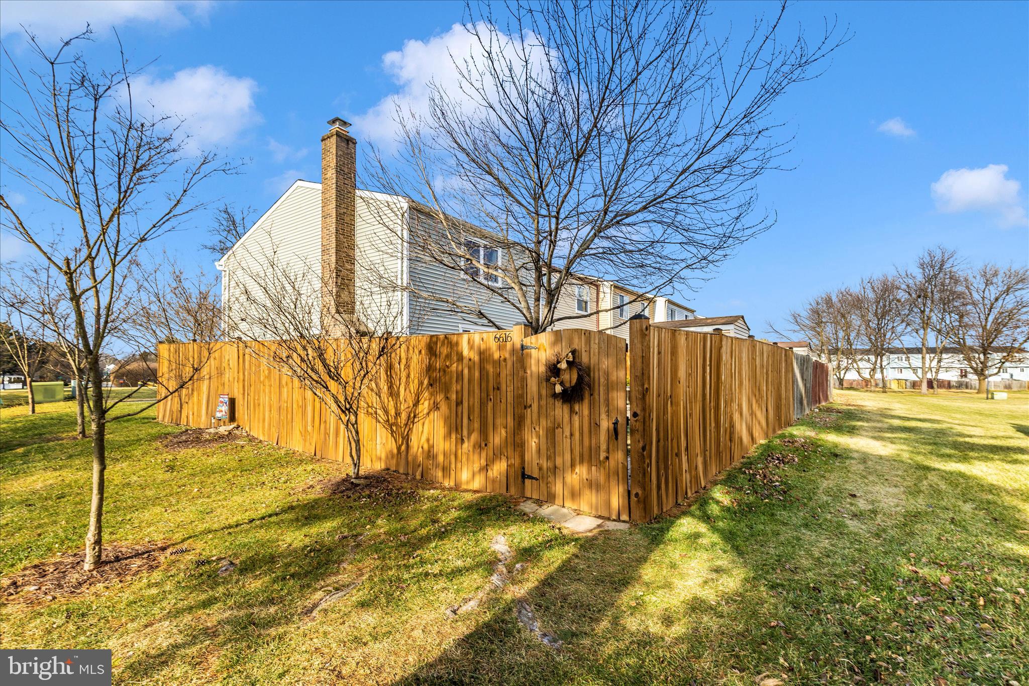 6616 Pebble Court Frederick, MD 21703 - Photo 27 of 33 a view of large trees with wooden fence