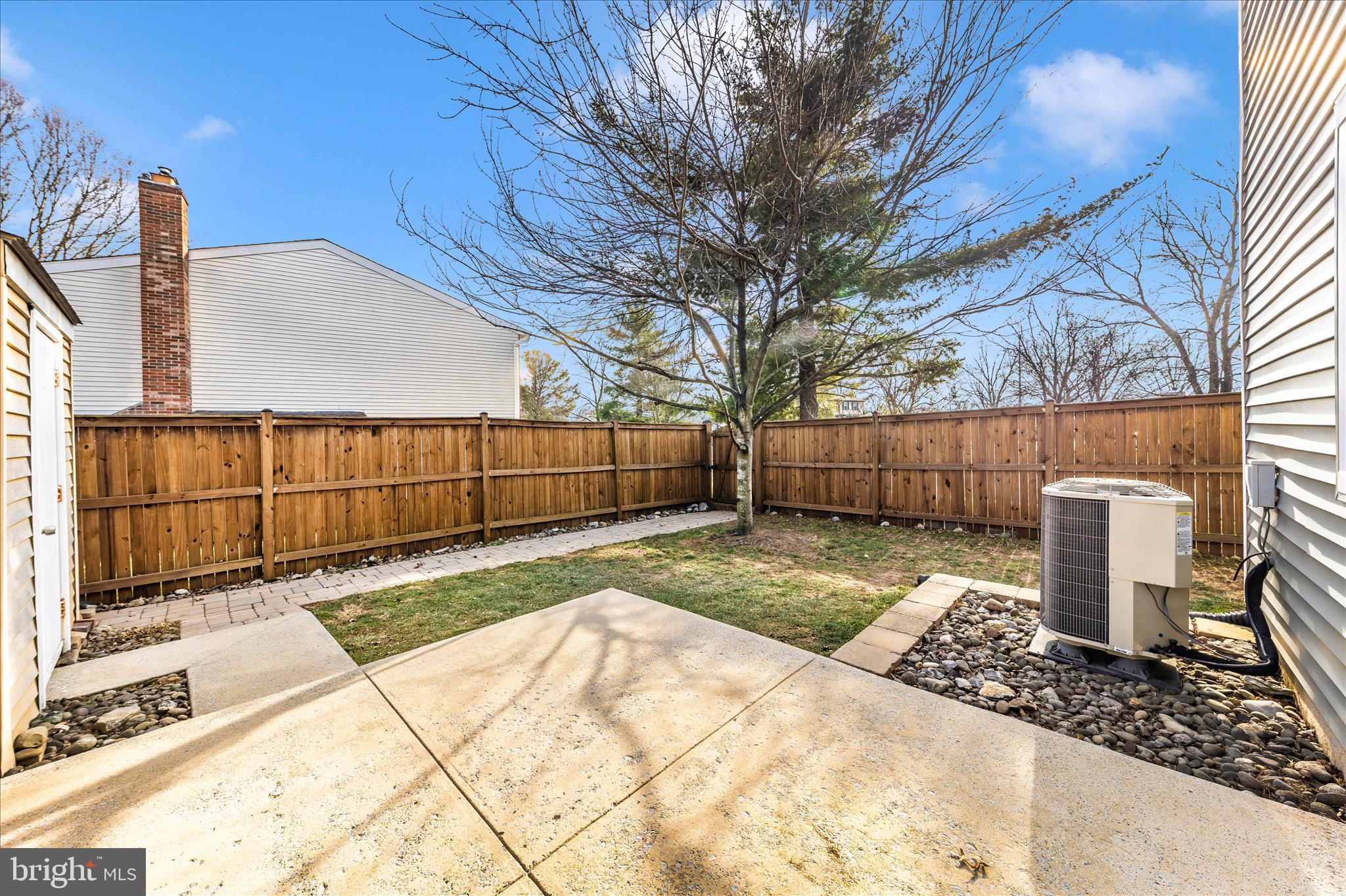 6616 Pebble Court Frederick, MD 21703 - Photo 30 of 33 a view of a backyard with fence