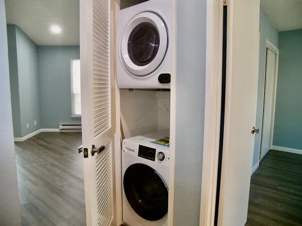 a utility room with dryer and washer