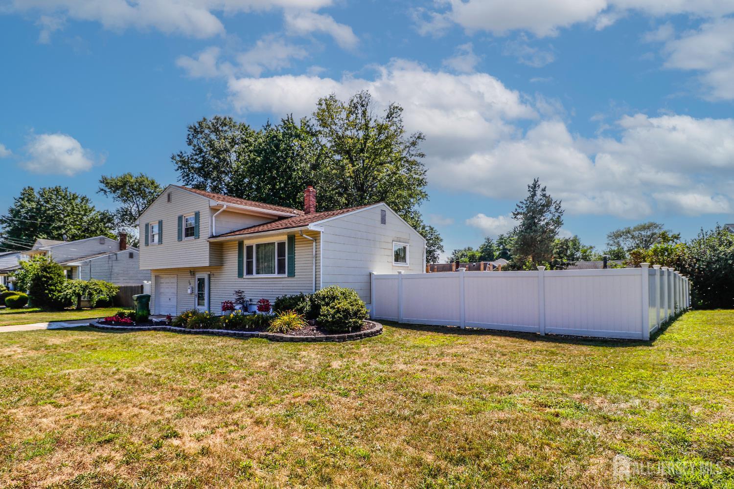26 Moryan Road Edison, NJ 08817 - Photo 3 of 32 front view of a house with a yard