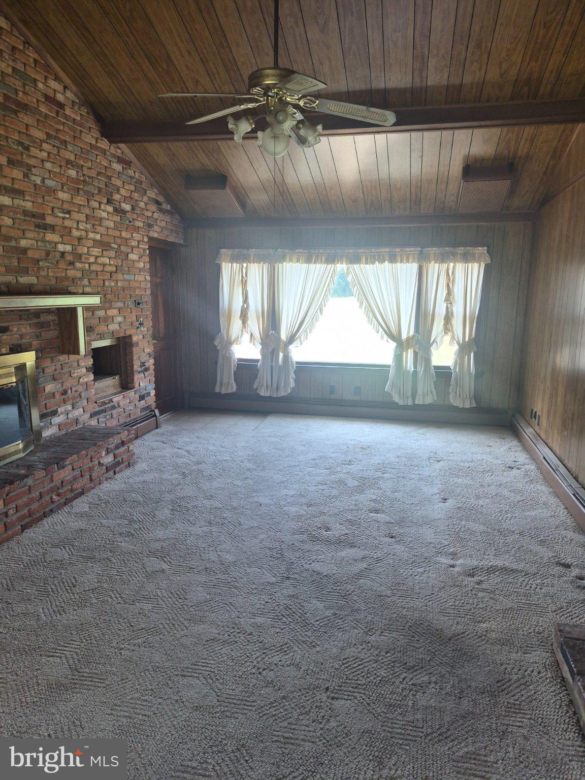 1043 Camp Road Denton, MD 21629 - Photo 3 of 17 Spacious living area with natural light.