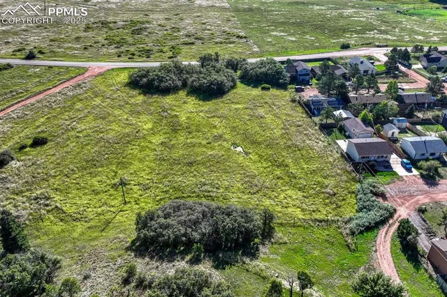 a view of a road with a yard