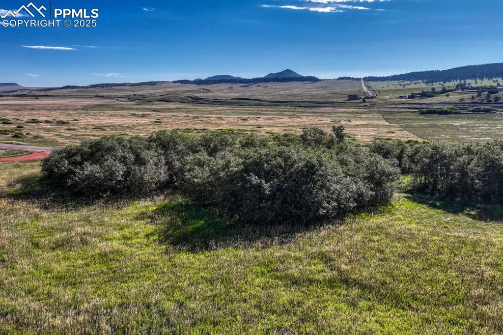 15989 South Perry Park Road Palmer Lake, CO 80133 - Photo 7 of 19 a view of lake with mountain