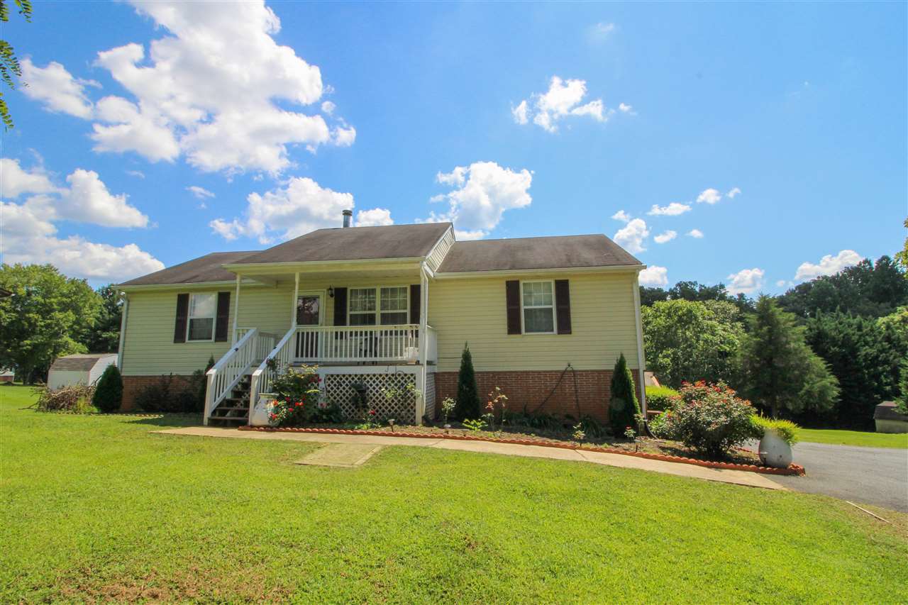 5146 Amicus Road Ruckersville, VA 22968 - Photo 3 of 23 a front view of a house with a yard