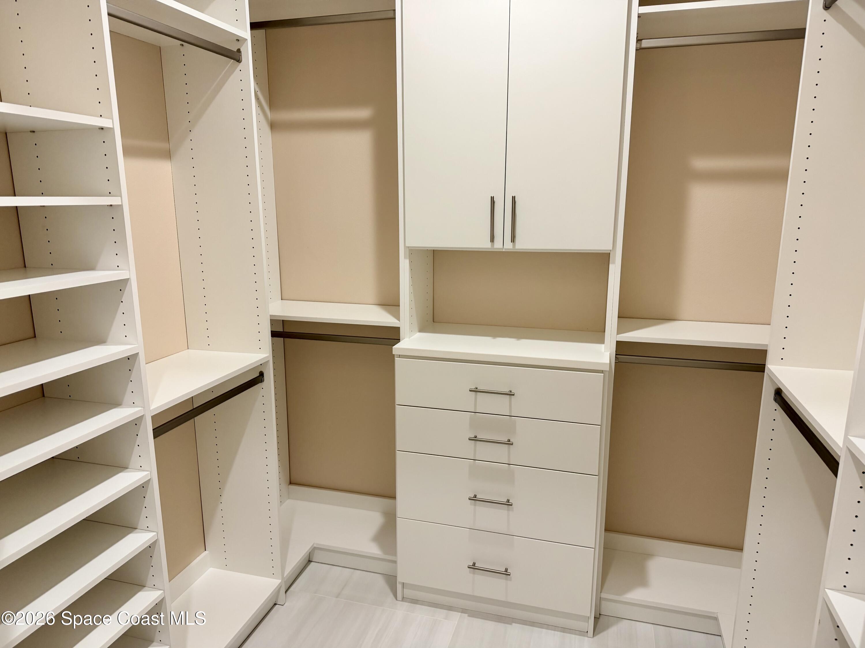 369 Tolley Avenue Melbourne, FL 32934 - Photo 18 of 33 a view of a walk in closet