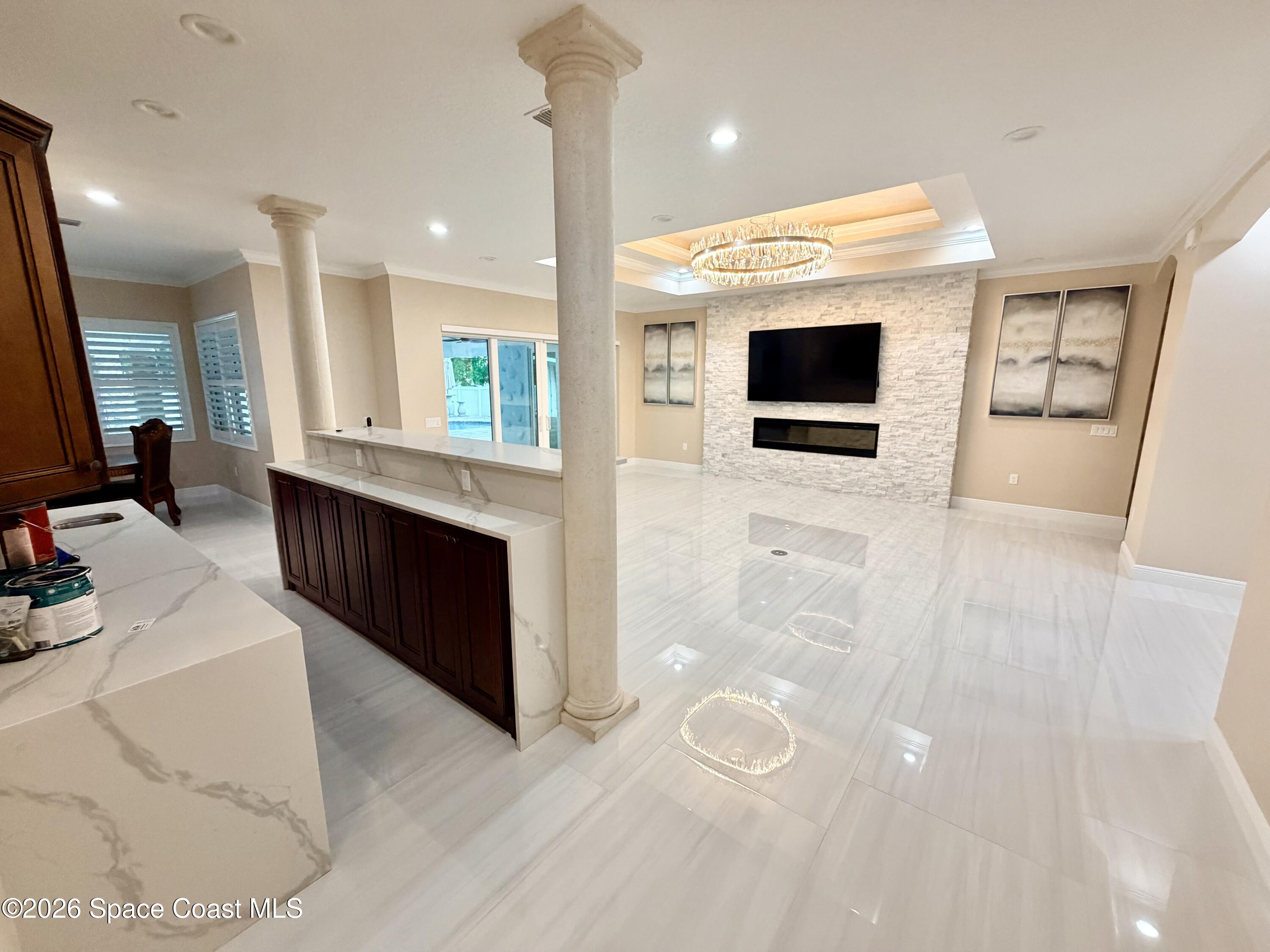 369 Tolley Avenue Melbourne, FL 32934 - Photo 6 of 33 a spacious bathroom with a large mirror