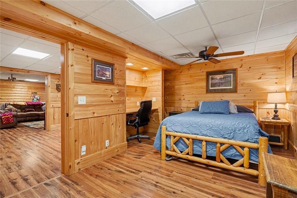 1164 Amberton Lane Powder Springs, GA 30127 - Photo 28 of 43 a bedroom with a bed and a view of living room