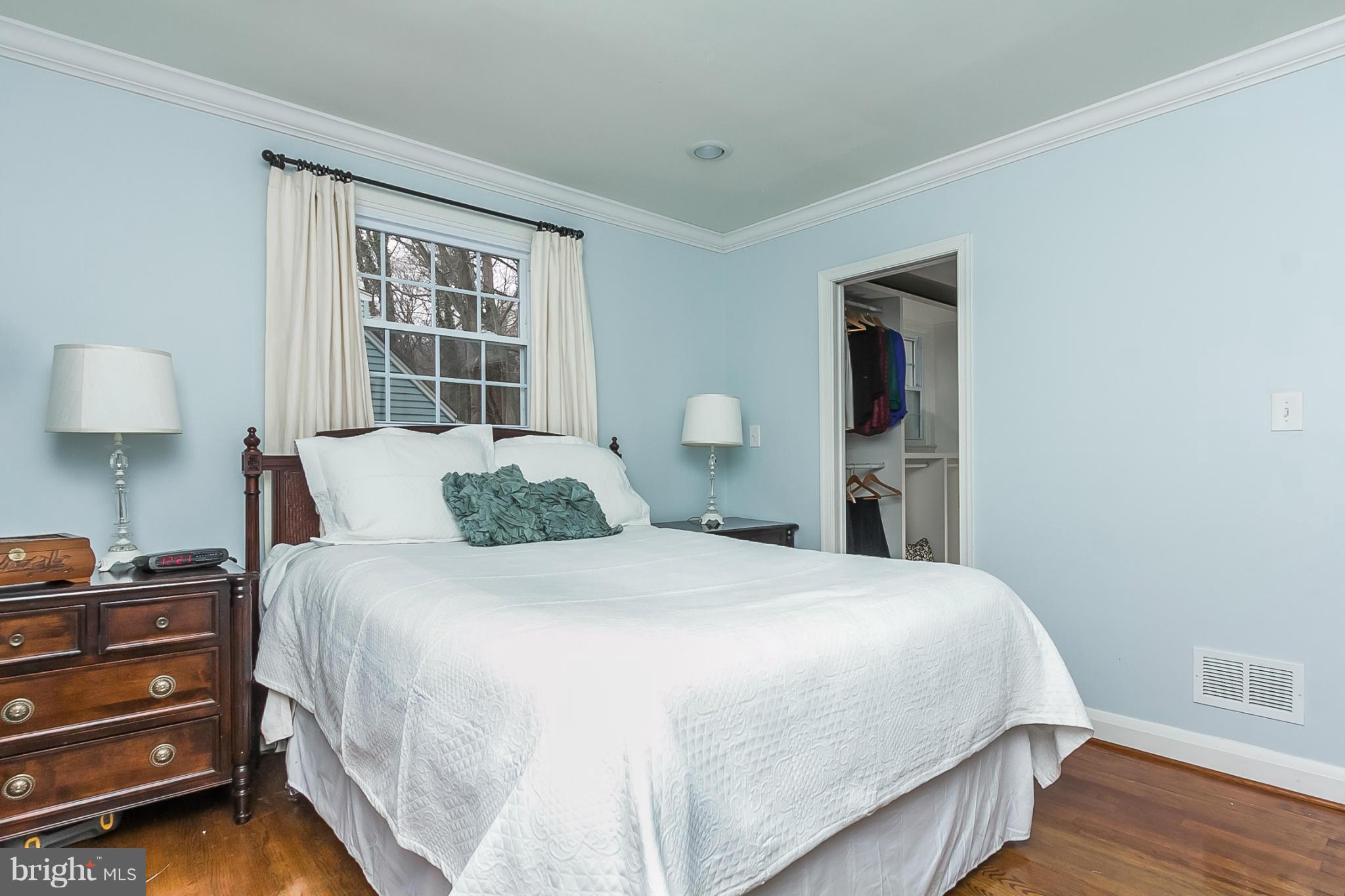 1908 Fairbank Road Baltimore, MD 21209 - Photo 13 of 27 a bedroom with a bed and a window