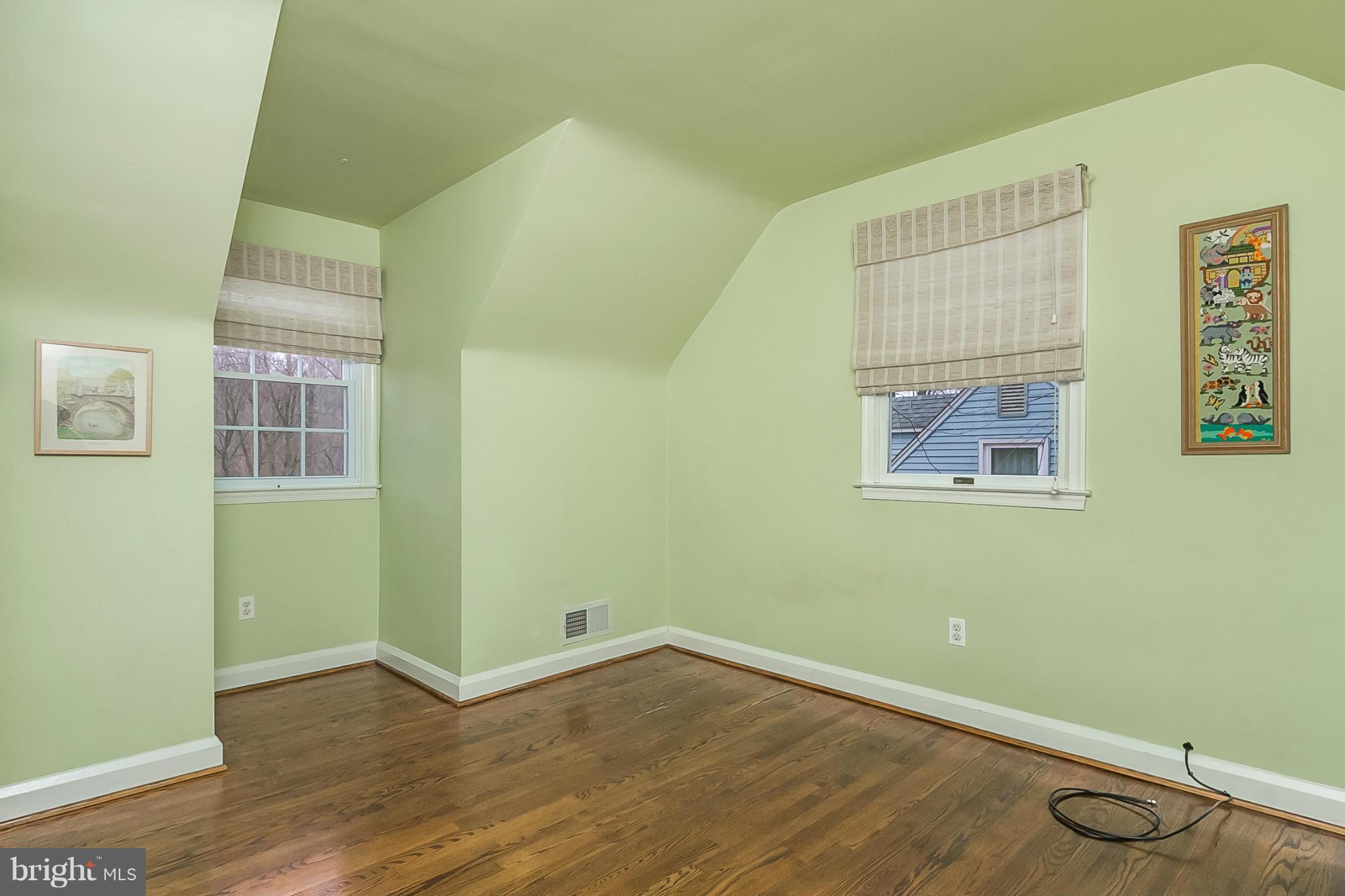 1908 Fairbank Road Baltimore, MD 21209 - Photo 16 of 27 a view of a room with wooden floor and windows