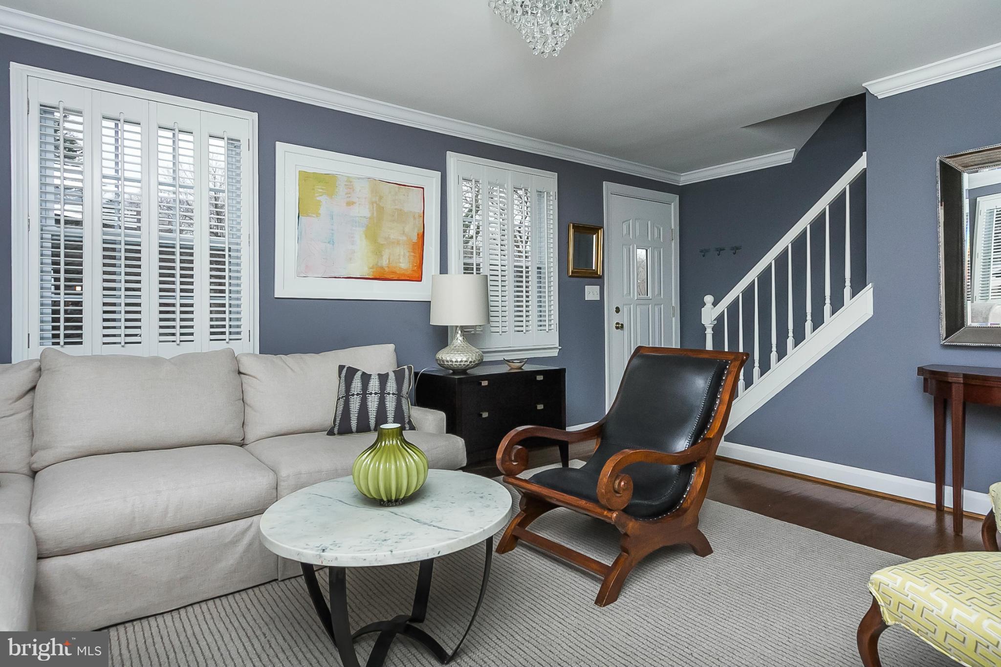 1908 Fairbank Road Baltimore, MD 21209 - Photo 3 of 27 a living room with furniture and a window
