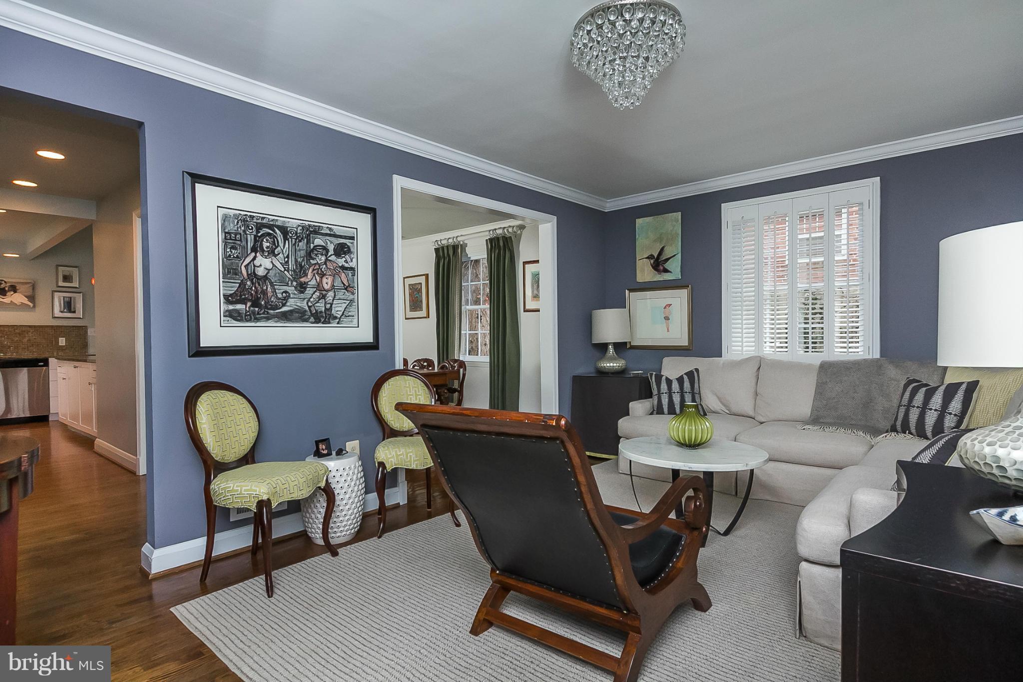 1908 Fairbank Road Baltimore, MD 21209 - Photo 4 of 27 a living room with furniture and a table
