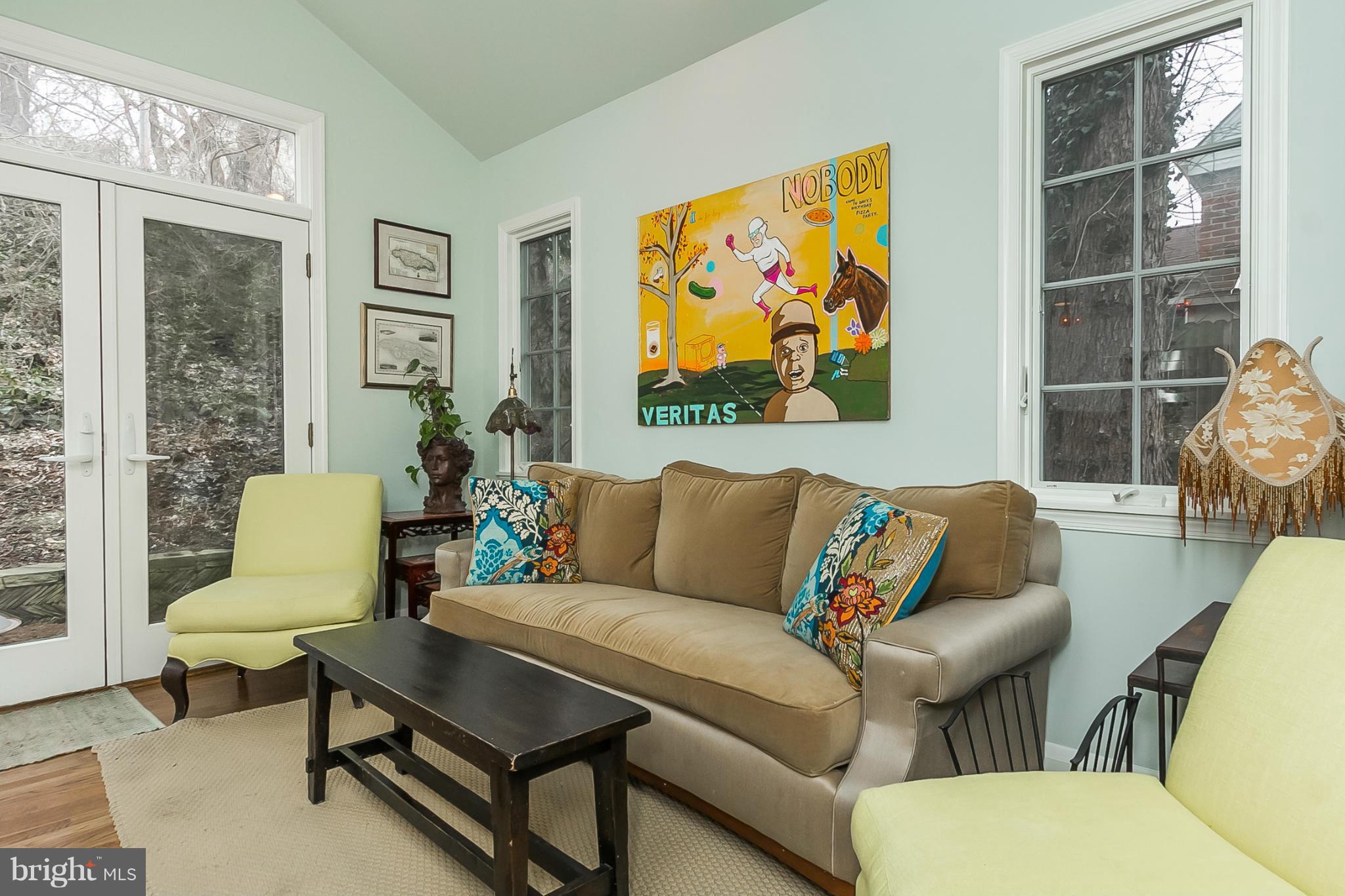 1908 Fairbank Road Baltimore, MD 21209 - Photo 8 of 27 a living room with furniture and a painting on the wall