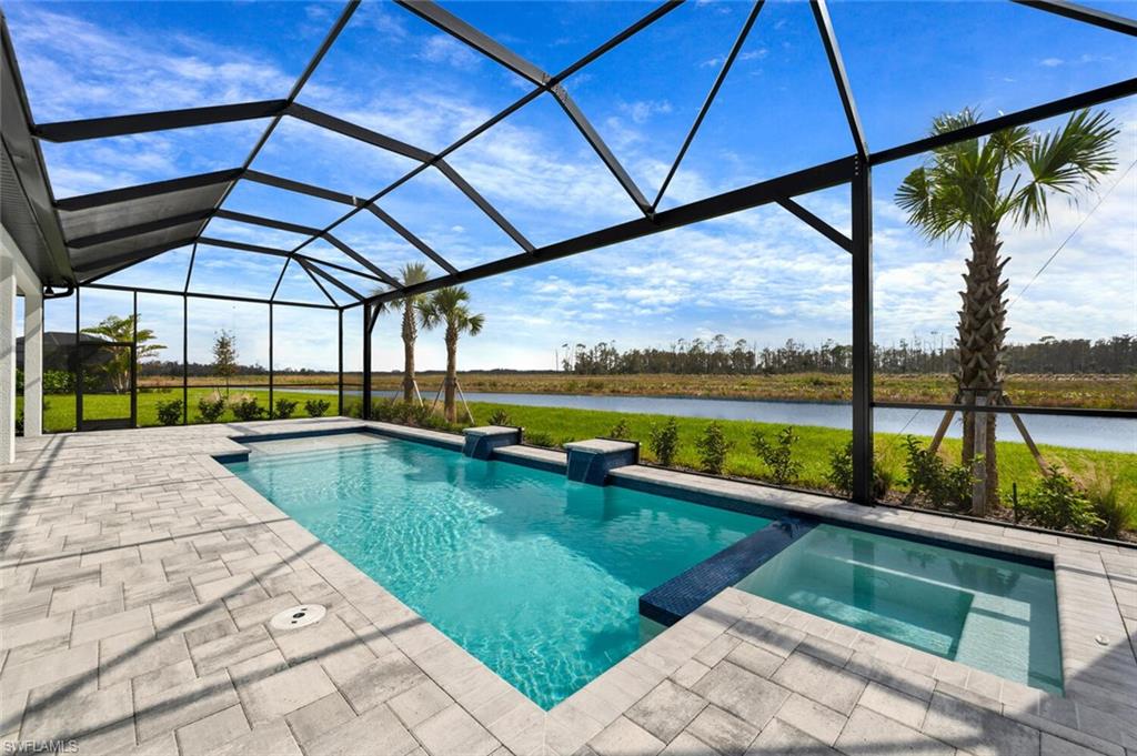 20557 Napa Loop Estero, FL 33928 - Photo 23 of 23 a view of swimming pool with a patio