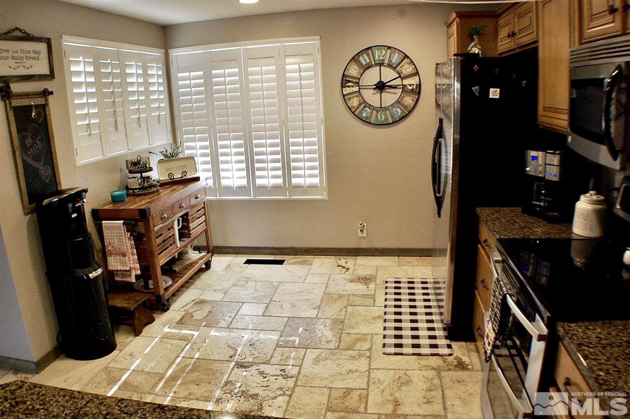 1422 Calusa Lane Reno, NV 89523 - Photo 3 of 18 a very nice looking room with a large window