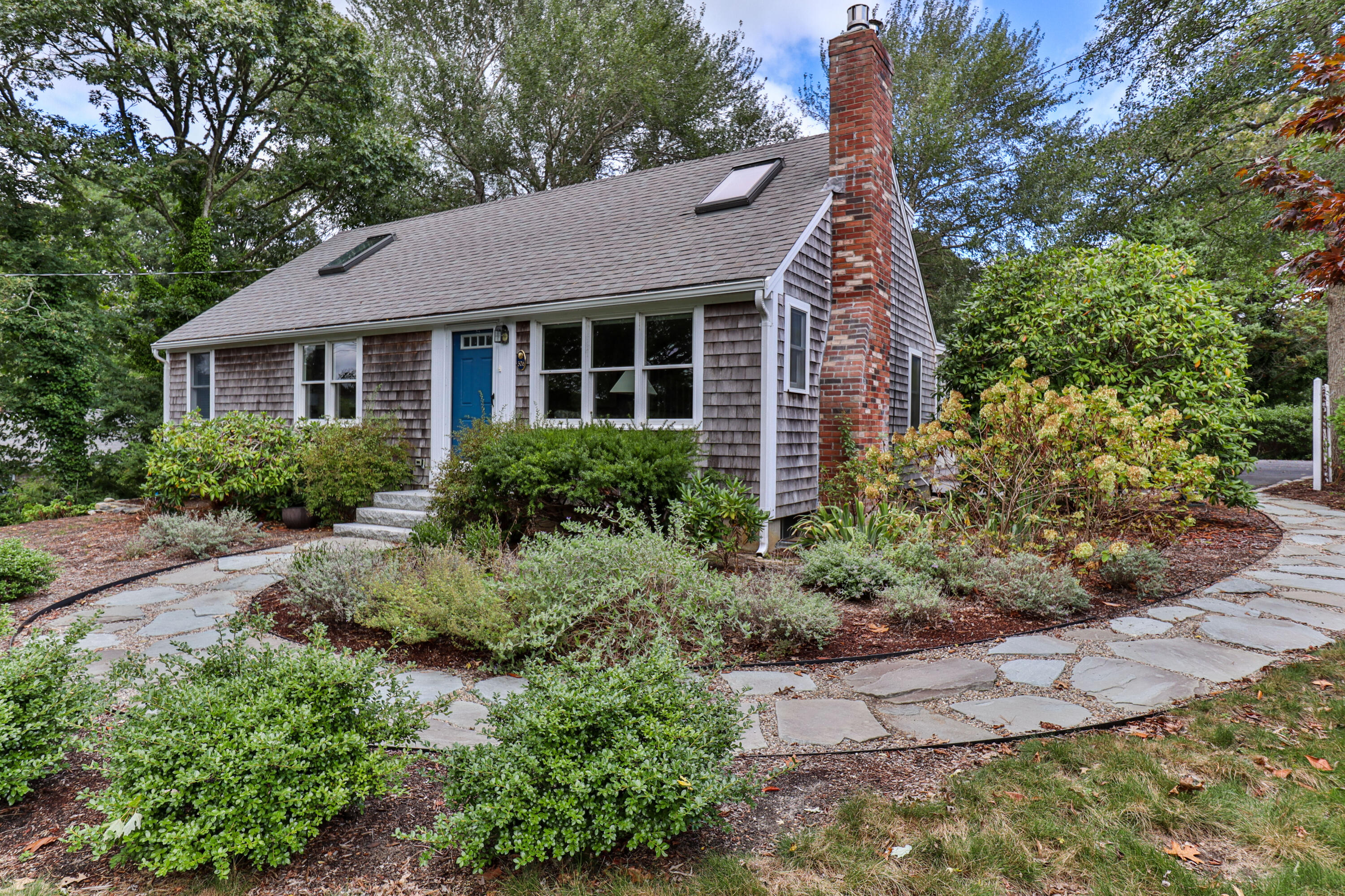 306 Old Queen Anne Road Chatham, MA 02633 - Photo 1 of 41 a view of a yard in front of house