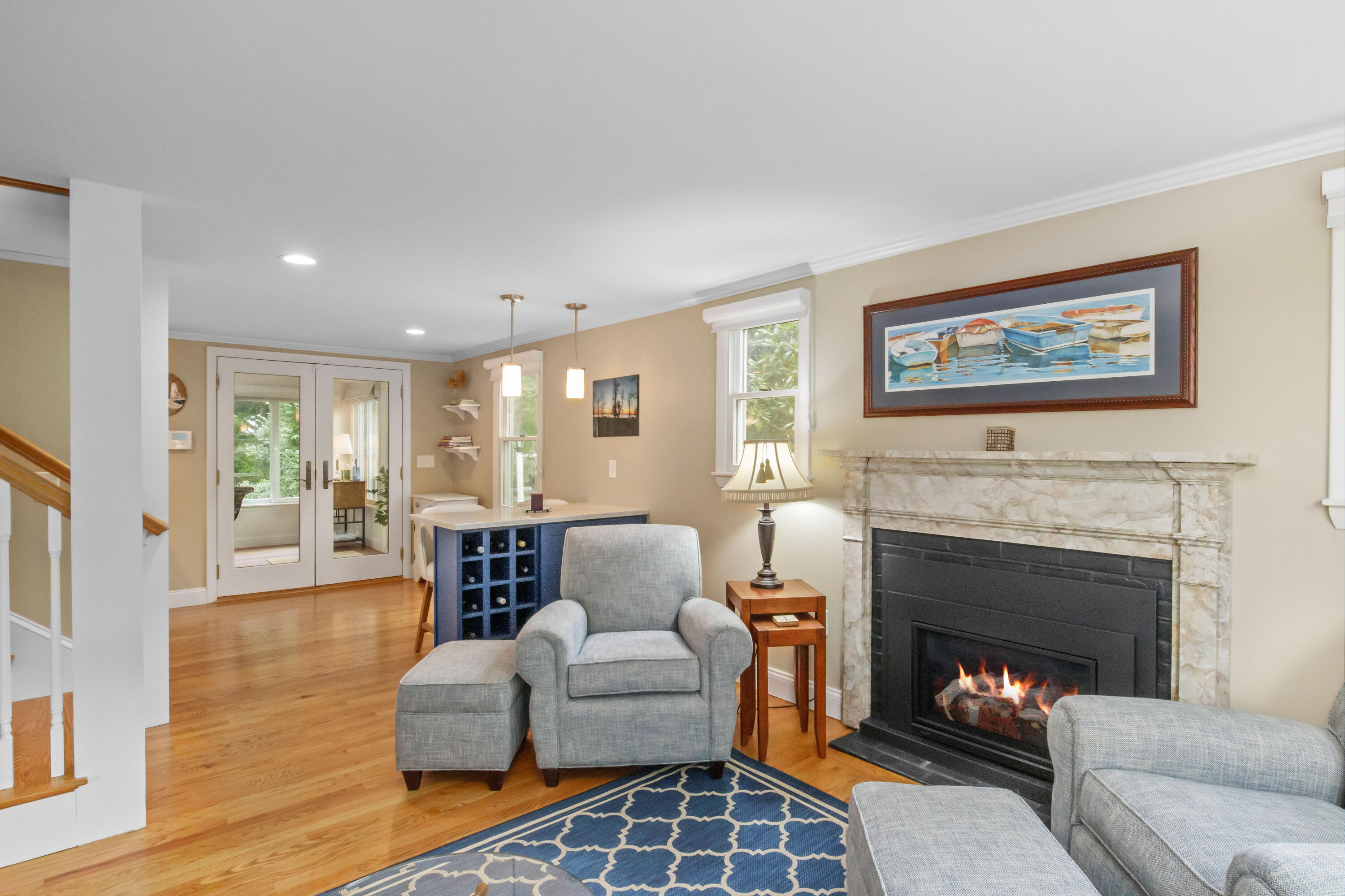 306 Old Queen Anne Road Chatham, MA 02633 - Photo 12 of 41 a living room with furniture and a fireplace