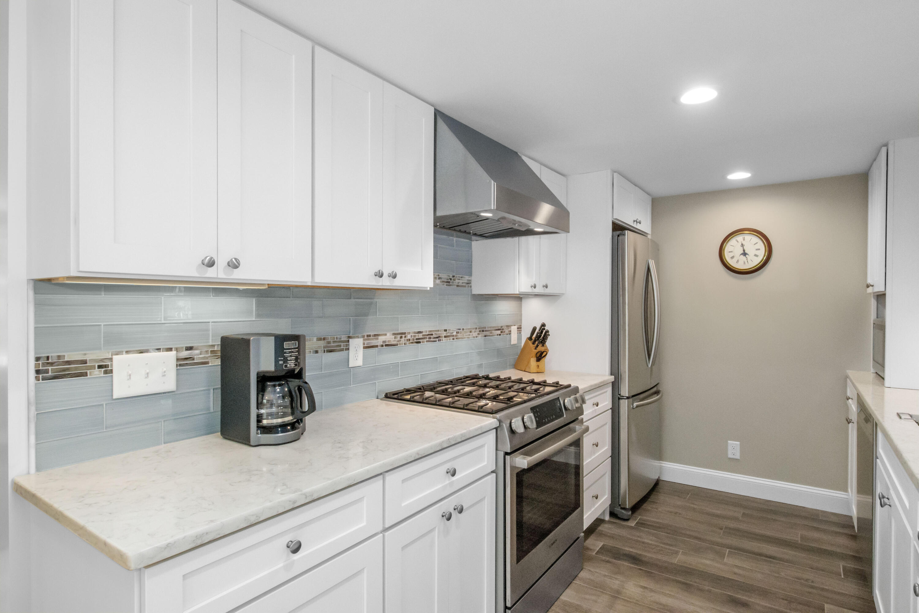 306 Old Queen Anne Road Chatham, MA 02633 - Photo 19 of 41 a kitchen with a white cabinets and white appliances
