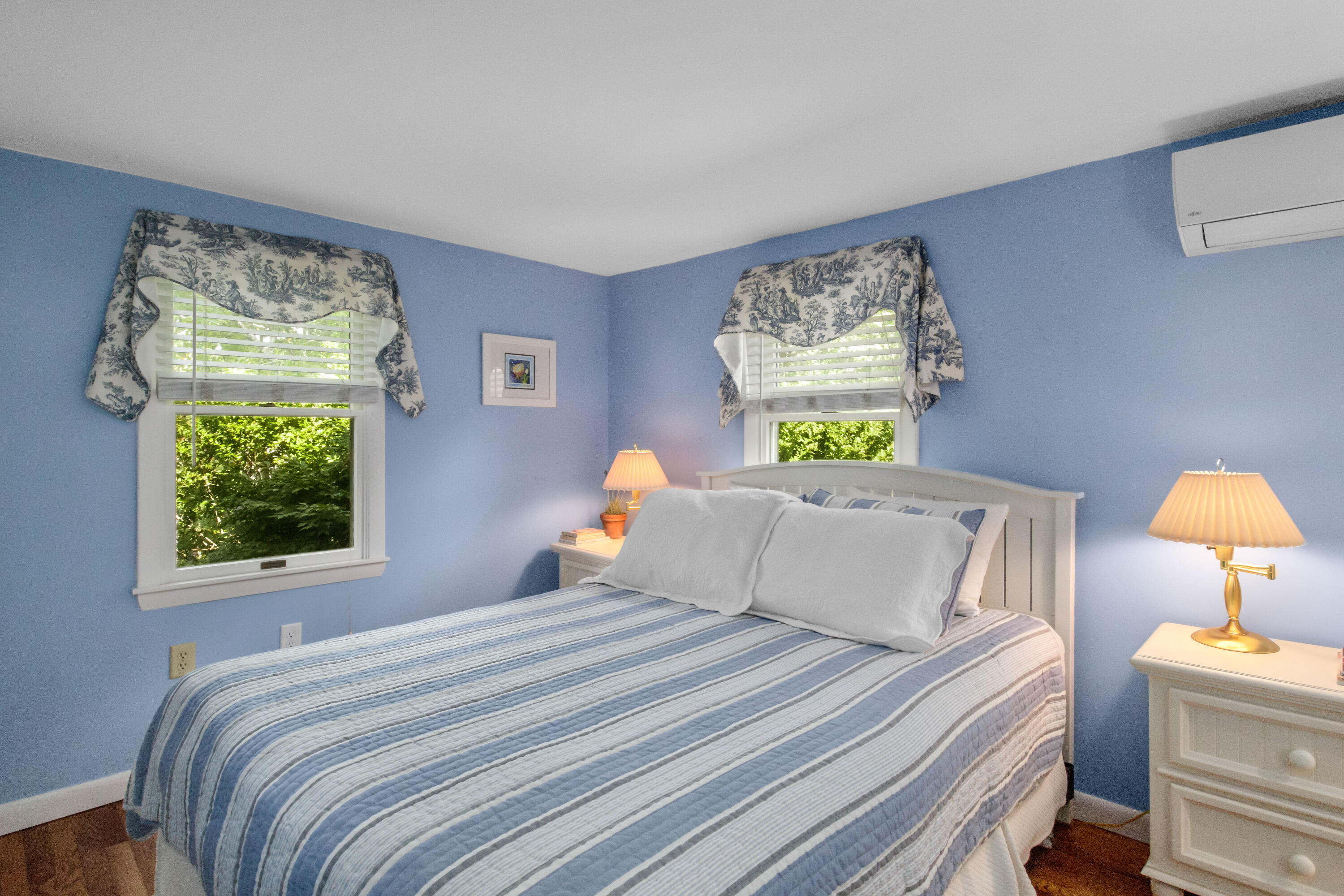 306 Old Queen Anne Road Chatham, MA 02633 - Photo 26 of 41 a bedroom with a bed and a lamp on dresser