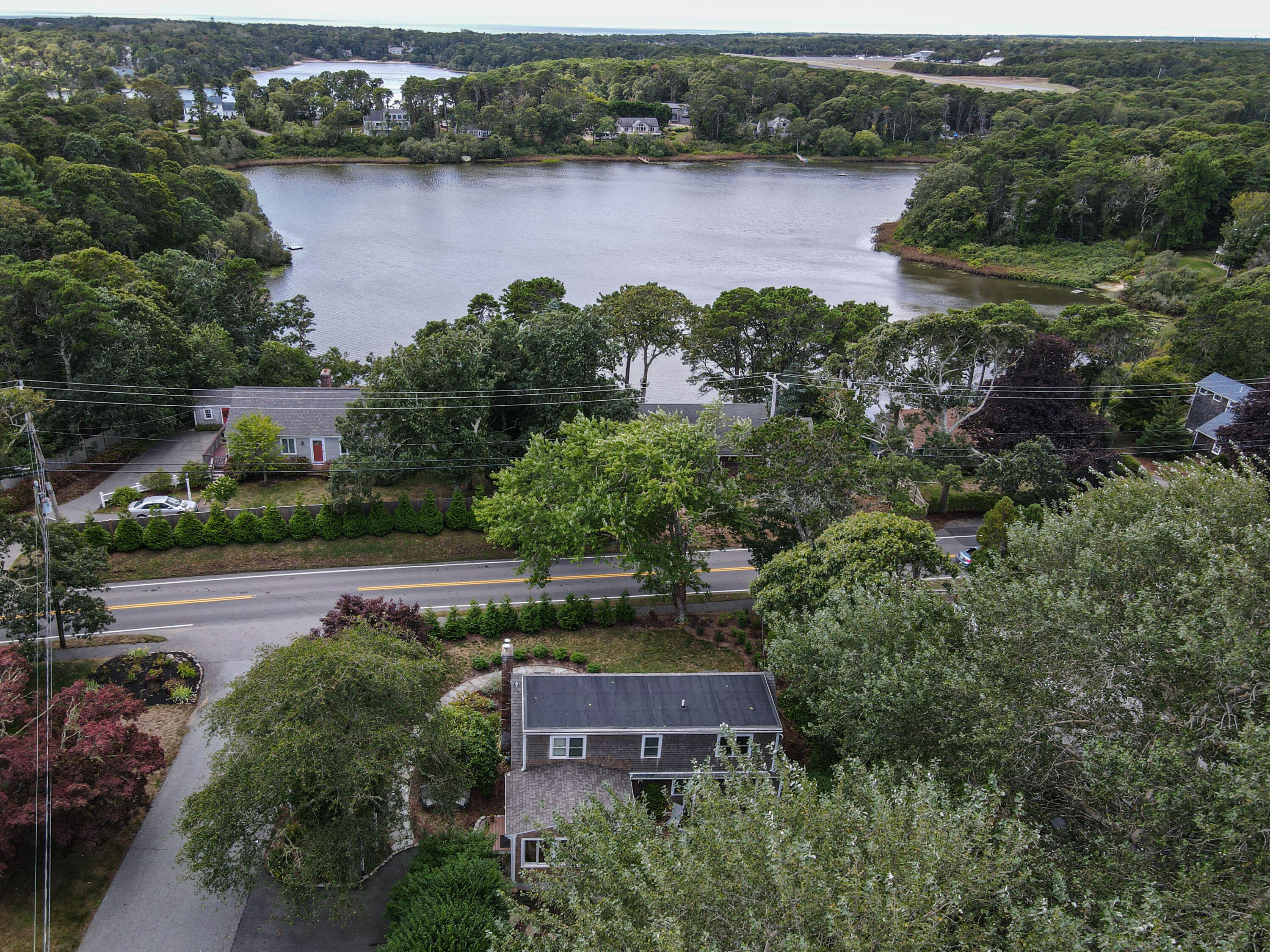 306 Old Queen Anne Road Chatham, MA 02633 - Photo 37 of 41 an aerial view of house with yard and lake view