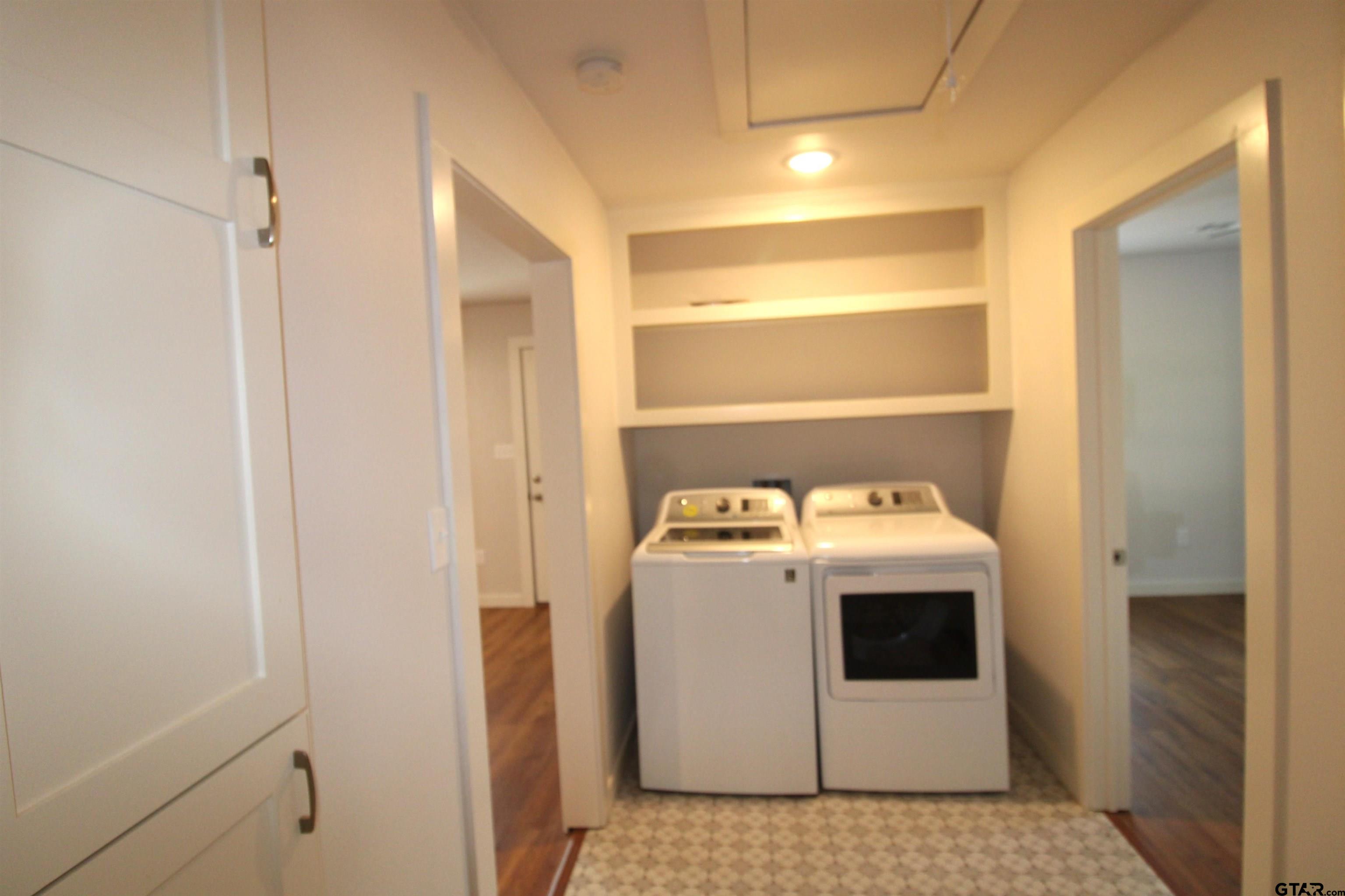 136 Long Shadow Drive Murchison, TX 75778 - Photo 15 of 19 a utility room with dryer and washer