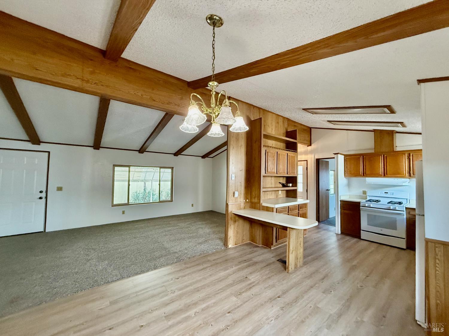 8148 D Street Windsor, CA 95492 - Photo 12 of 30 a view of an empty room with a window and wooden floor