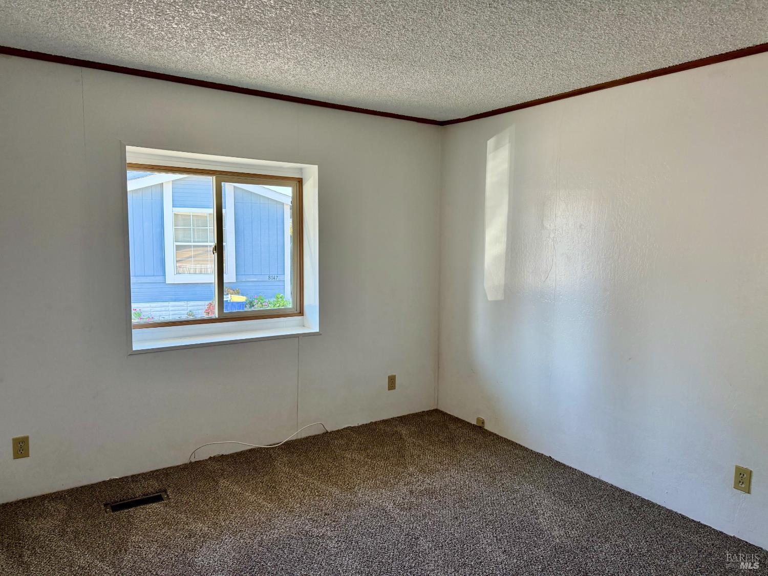8148 D Street Windsor, CA 95492 - Photo 14 of 30 a view of an empty room with a window