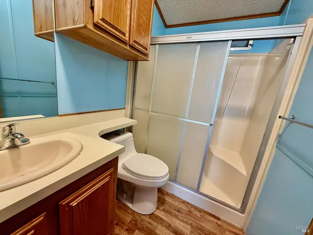 a bathroom with a sink and toilet
