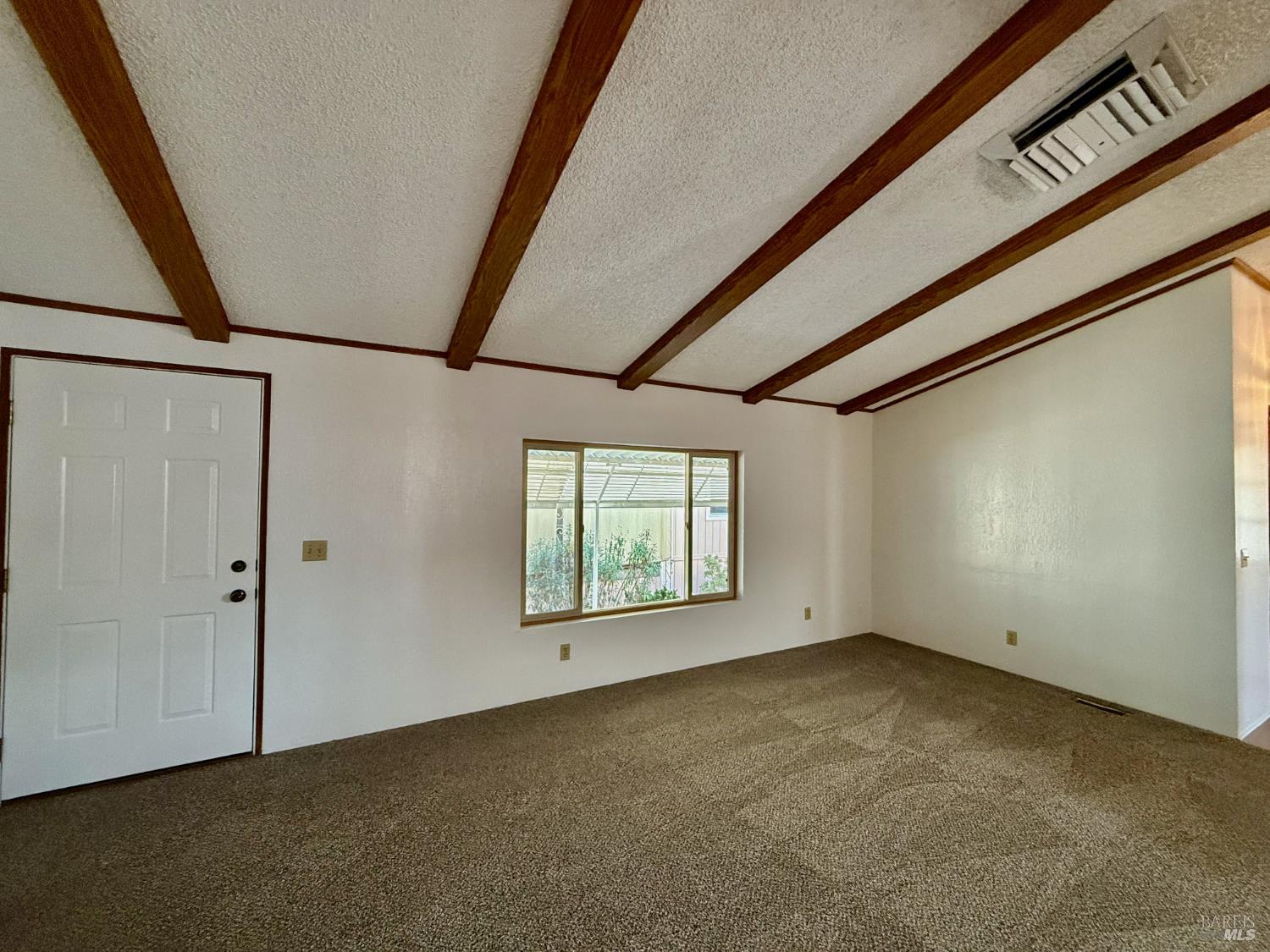 8148 D Street Windsor, CA 95492 - Photo 5 of 30 a view of a big room with windows