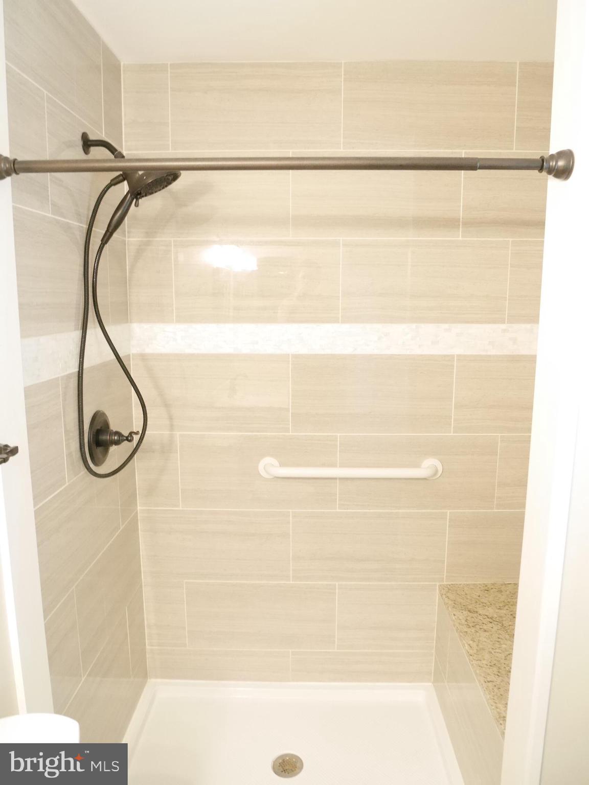 1705 Hambrooks Boulevard Cambridge, MD 21613 - Photo 13 of 22 a bathroom with a shower