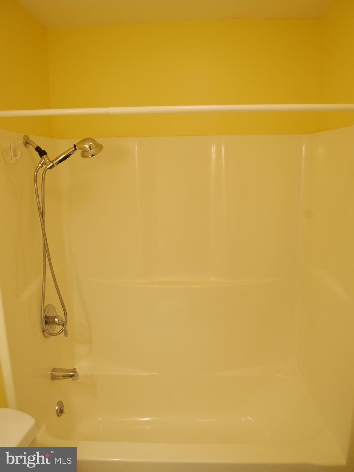 1705 Hambrooks Boulevard Cambridge, MD 21613 - Photo 17 of 22 a bathroom with a shower