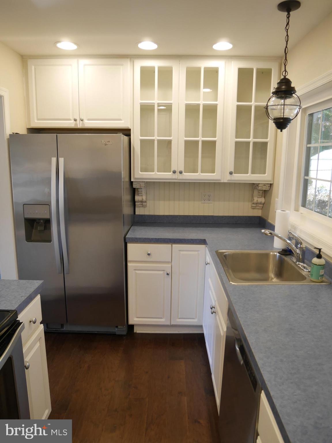 1705 Hambrooks Boulevard Cambridge, MD 21613 - Photo 8 of 22 a kitchen with a refrigerator a sink and dishwasher