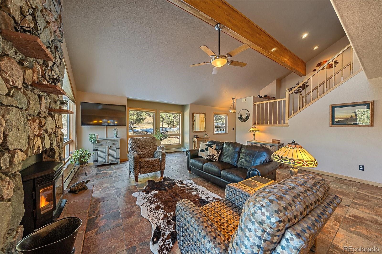 31196 Roberts Road Pine, CO 80470 - Photo 8 of 50 a bedroom with furniture and a window