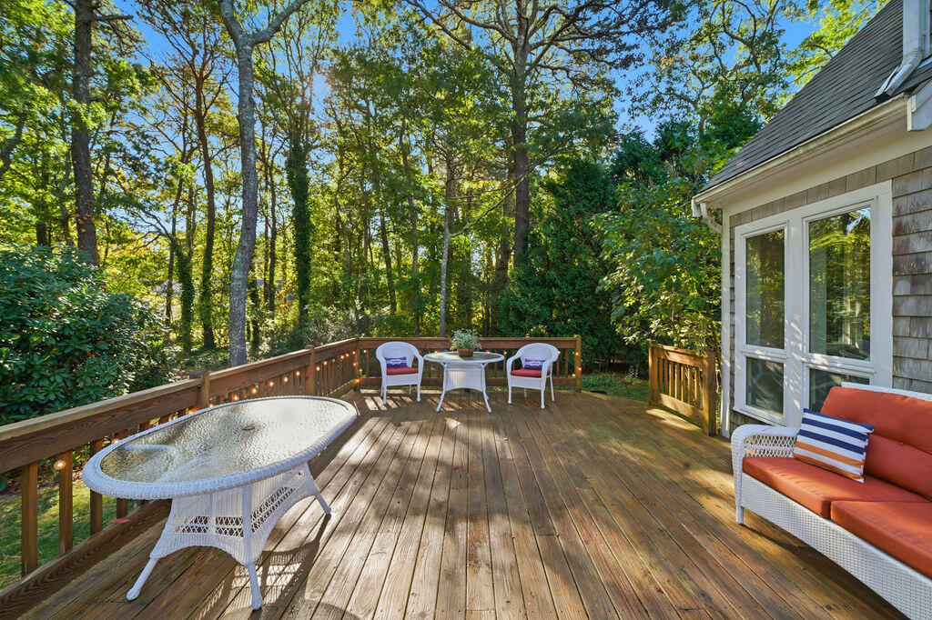 42 Eventide Lane Hyannis, MA 02601 - Photo 15 of 39 a view of a chairs and table in the balcony