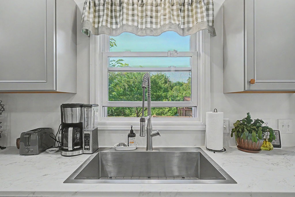 175 Gentry Gray Road Cadiz, KY 42211 - Photo 10 of 46 a kitchen with a sink and a window