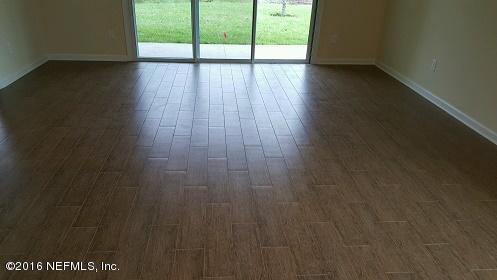 3334 Chestnut Ridge Way Orange Park, FL 32065 - Photo 8 of 24 CR- Aspen - Family Rm Wood-Look Tile Flo