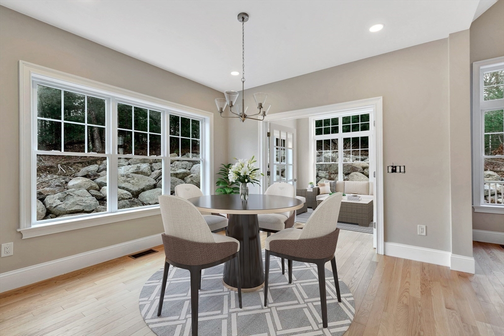 30 Weber Farm Road, Unit 30 Wrentham, MA 02093 - Photo 8 of 31 a view of a dining room with furniture window and wooden floor