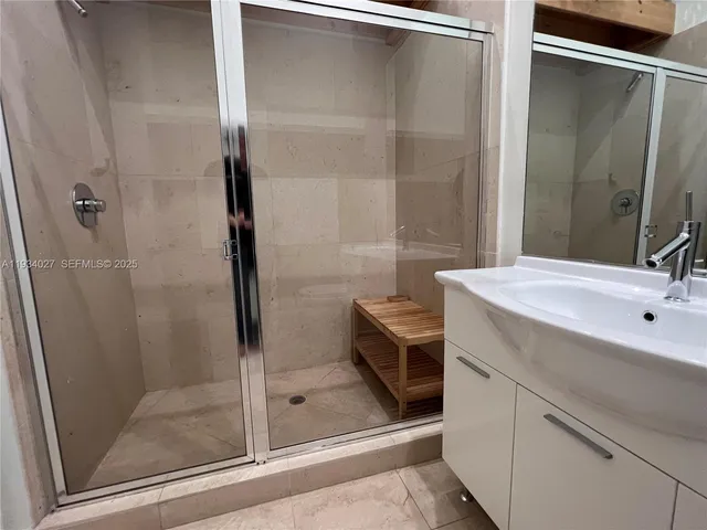 a view of a city with tall buildings