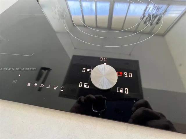 a bedroom with furniture and a flat screen tv