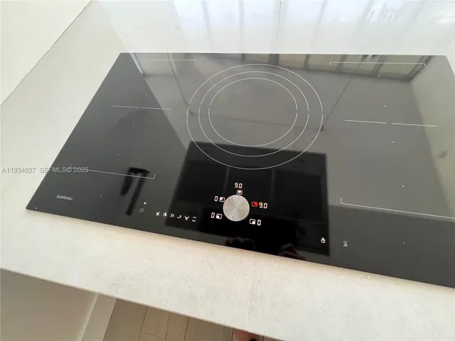 a room with furniture and a flat screen tv