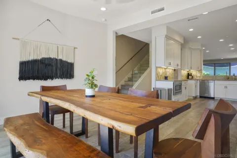 a living room with fireplace furniture and a flat screen tv