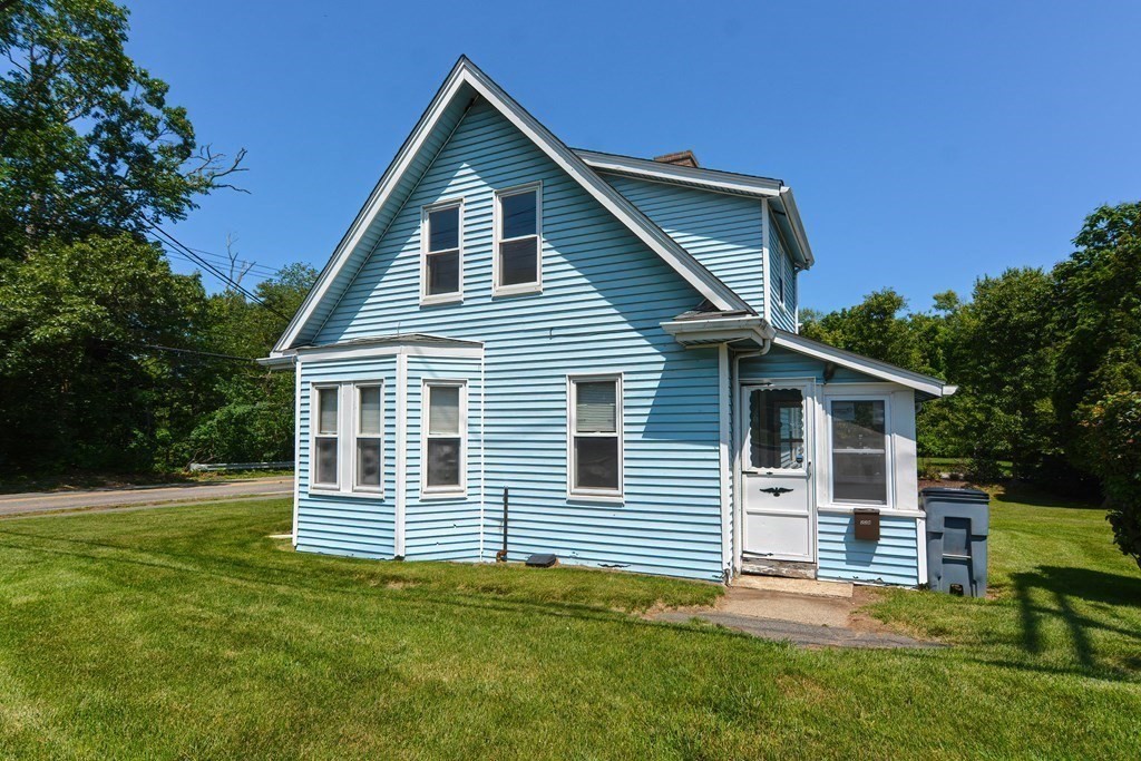 228 Pond Street Natick, MA 01760 - Photo 33 of 36 a view of a house with a yard