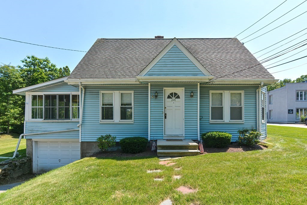 228 Pond Street Natick, MA 01760 - Photo 35 of 36 front view of a house and a yard