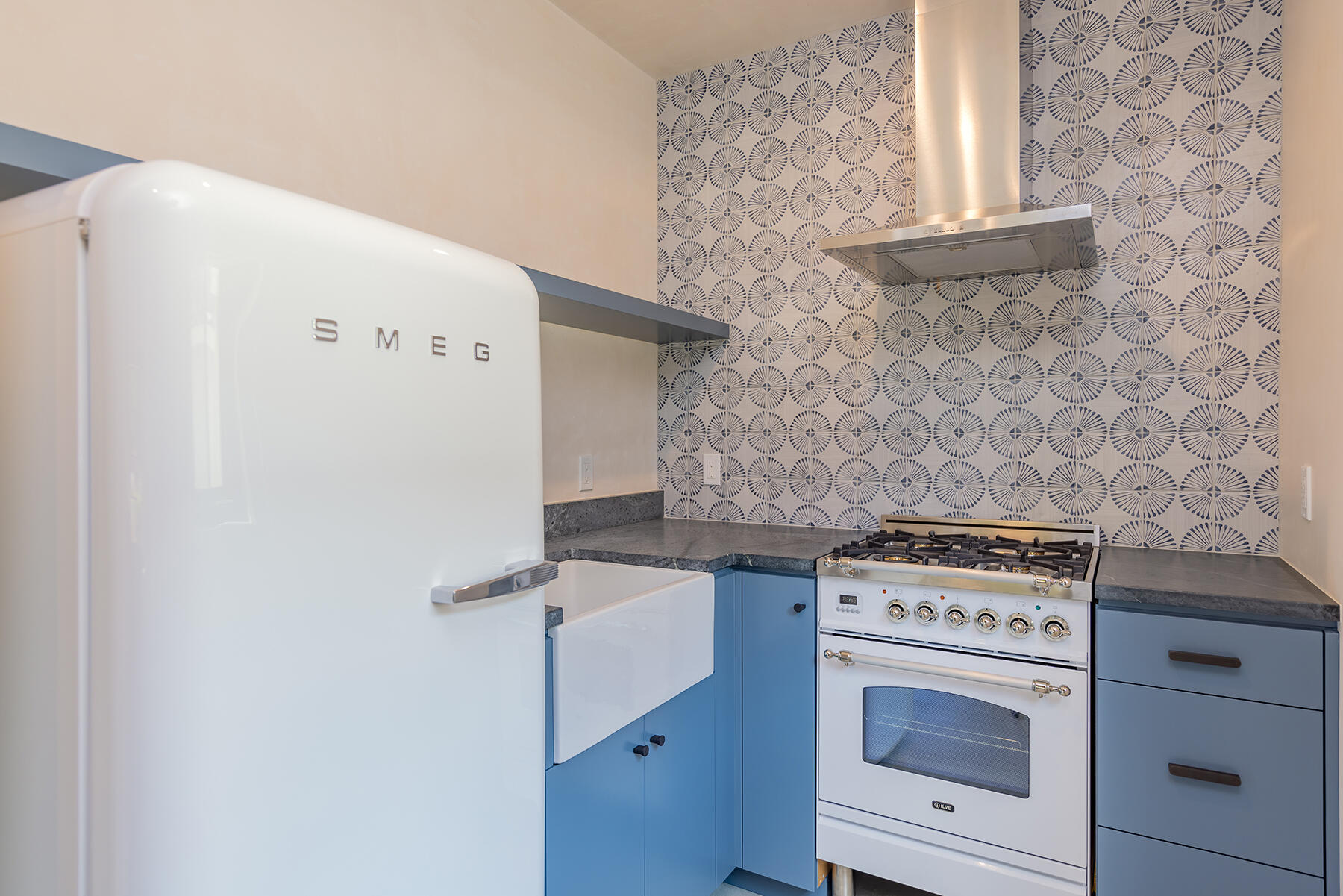 110 Fox Street Ojai, CA 93023 - Photo 25 of 30 a stove top oven sitting inside of a kitchen