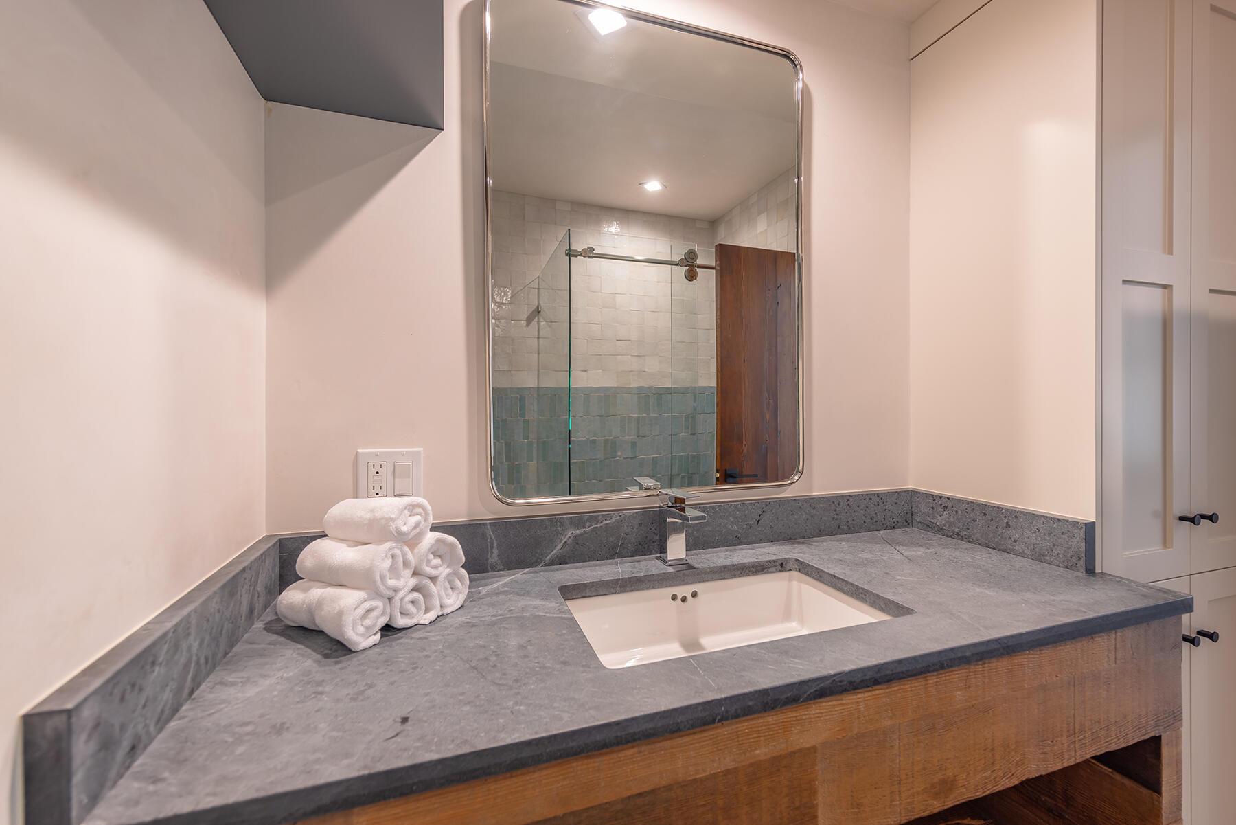110 Fox Street Ojai, CA 93023 - Photo 26 of 30 a bathroom with a granite countertop sink and a mirror