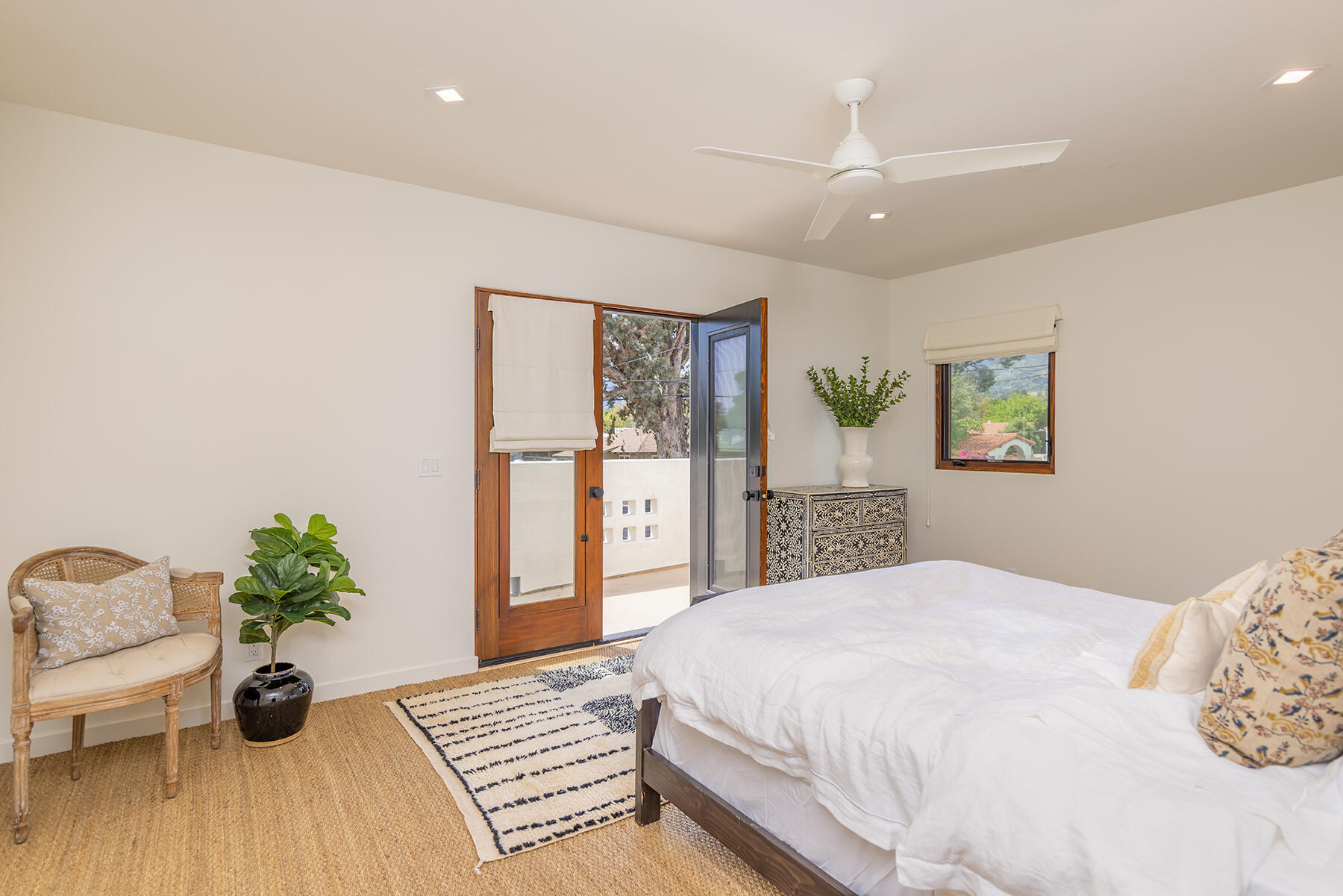 110 Fox Street Ojai, CA 93023 - Photo 10 of 30 a spacious bedroom with a bed and a couch