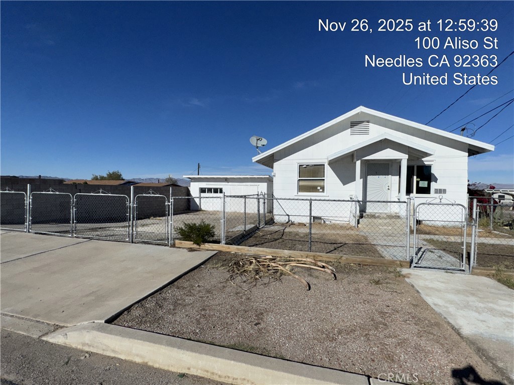 a front view of a house with garage