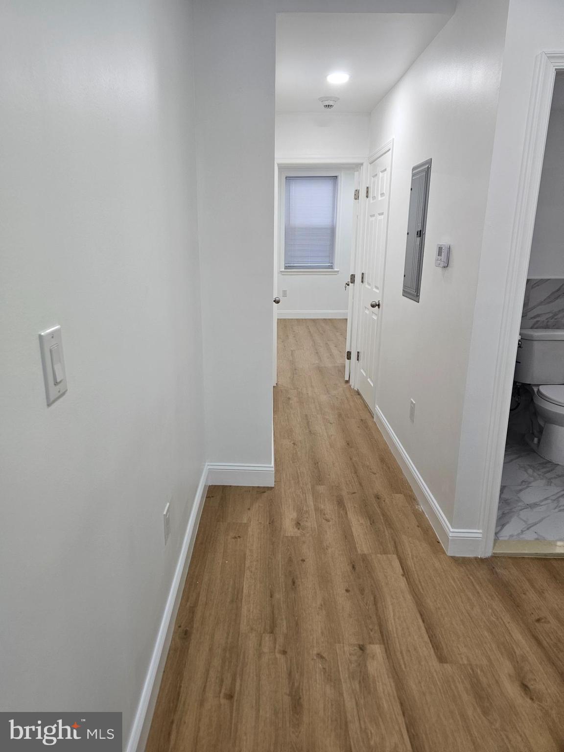 2102 Reed Street Philadelphia, PA 19146 - Photo 5 of 9 a view of hallway with wooden floor