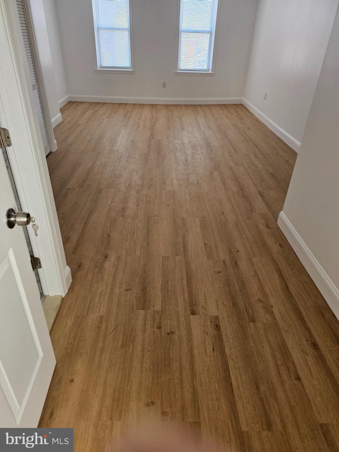 2102 Reed Street Philadelphia, PA 19146 - Photo 7 of 9 wooden floor in a white room